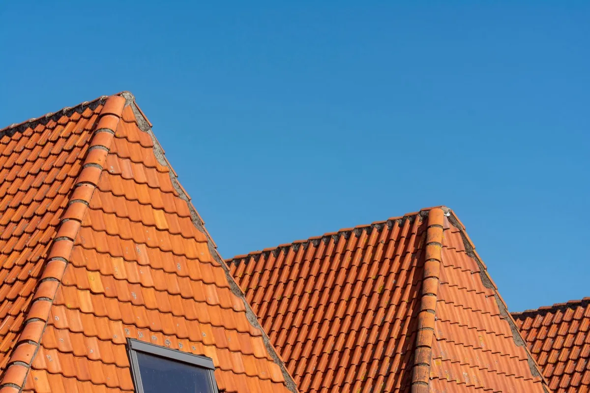 Clay barrel tile rooflines on homes in Miami Gardens, FL