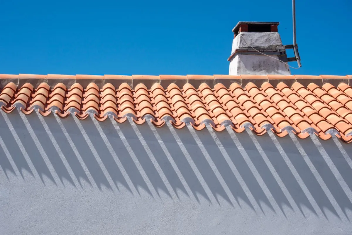 Roof ridge line and chimney on a home in Miami Gardens, FL